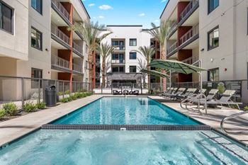 Resort style swimming pool with spa